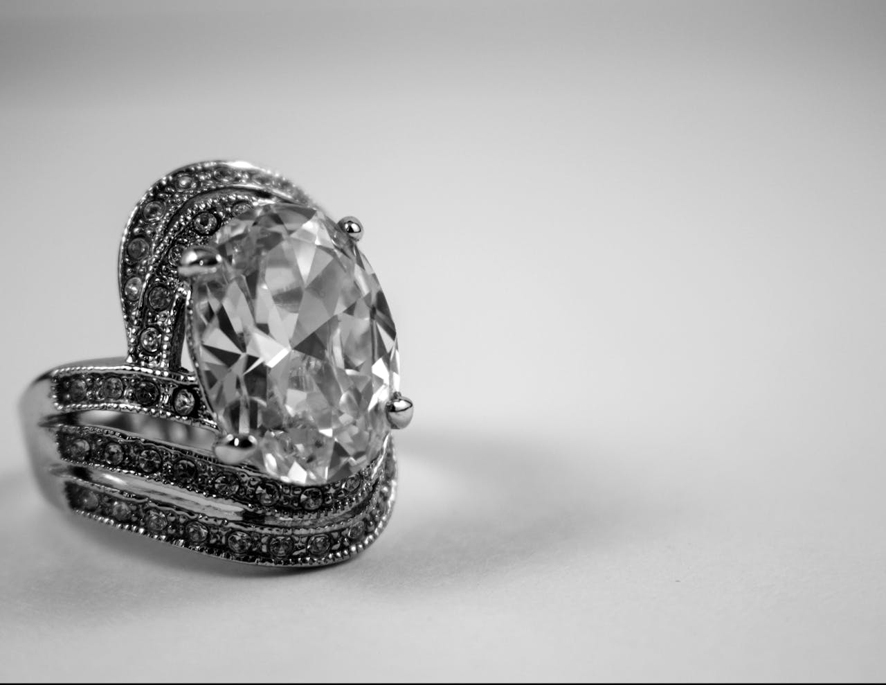 who-we-are Close-up of a luxurious diamond ring showcasing intricate design and elegance.